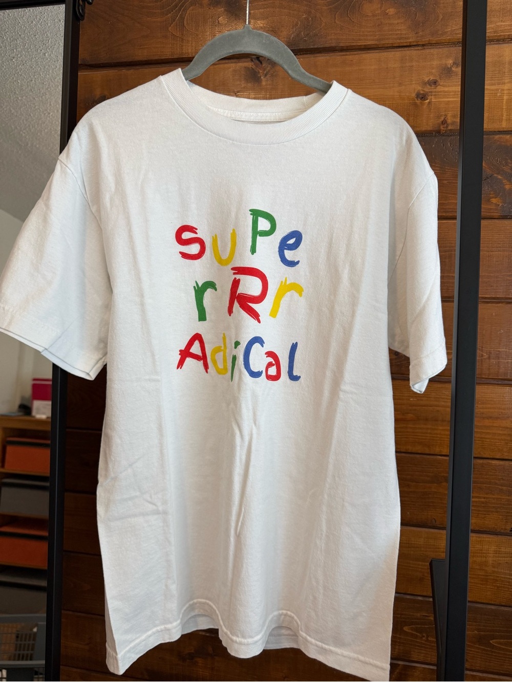 White Short-Sleeve Graphic Tee with Multicolor 'Super Radical' Print